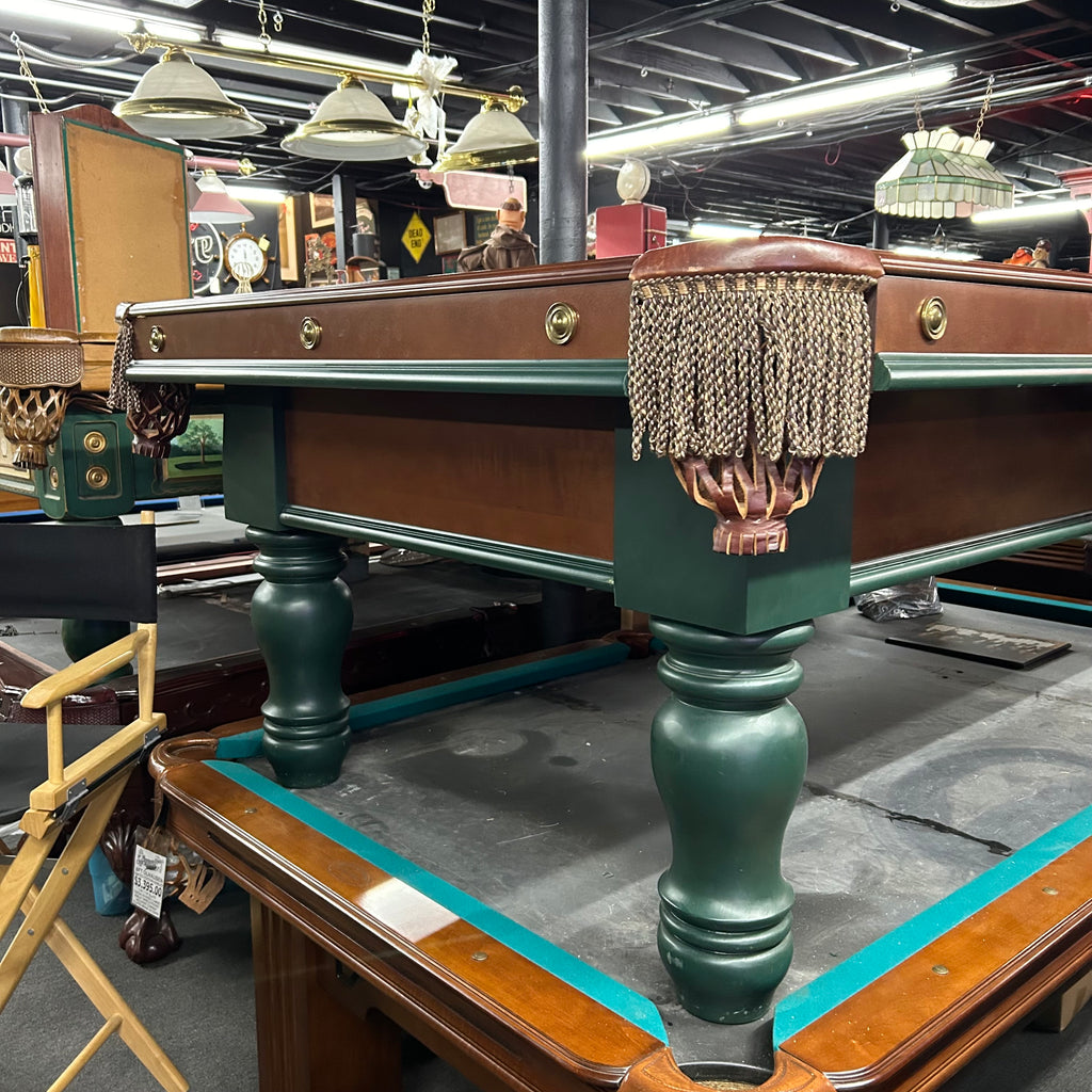 Corner view of pool table with round leg and fringe pocket in two tone finish
