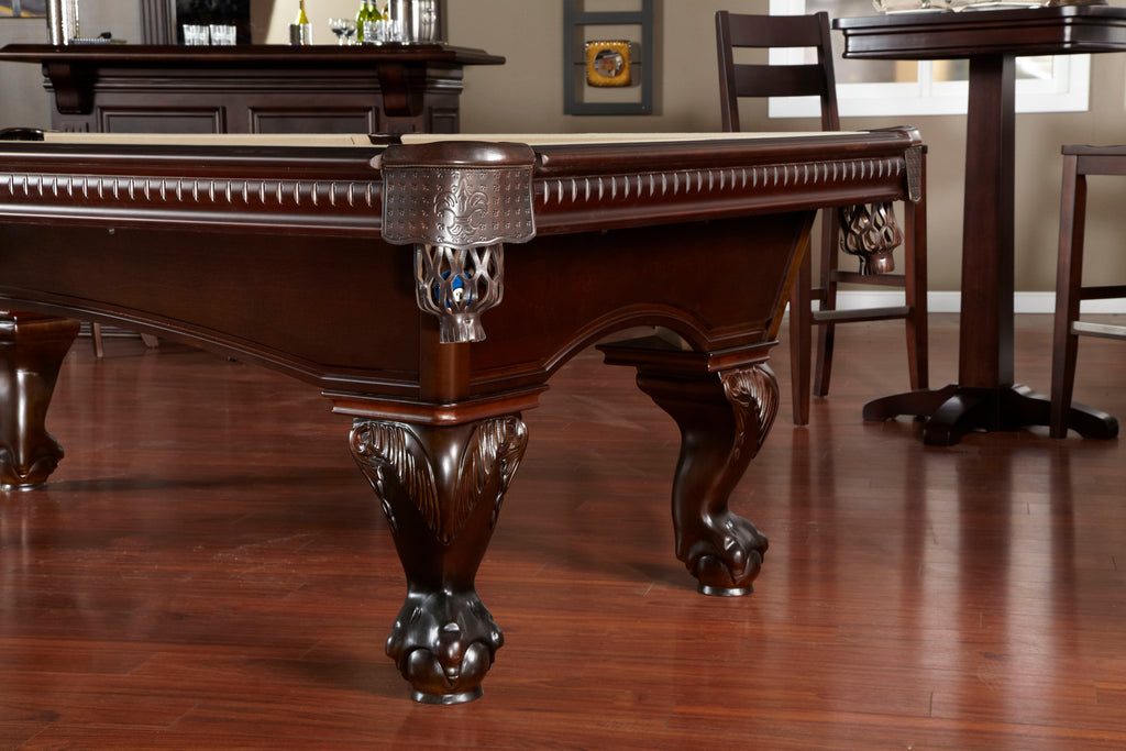 Marietta pool table with hardwood floor in sierra finish corner and leg