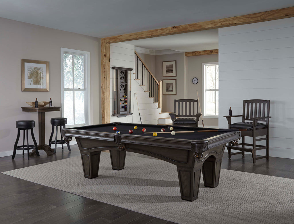 Pool table in room with riverbank finish and black felt