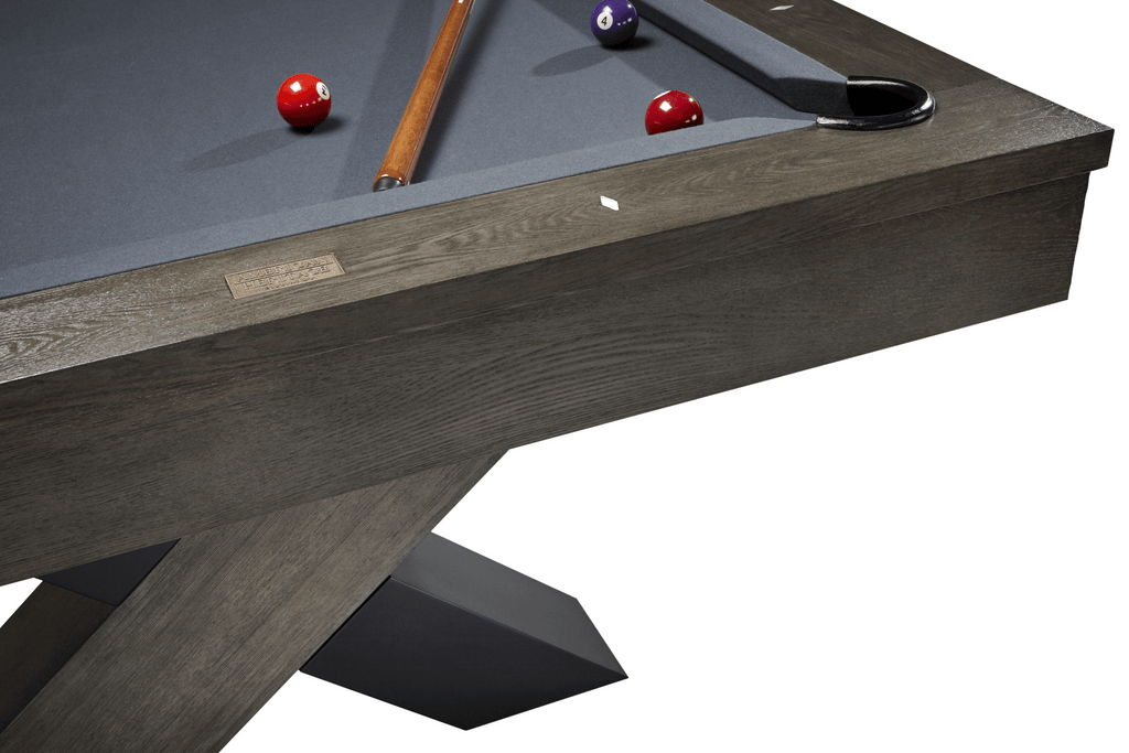 corner view of pool table showing charcoal grey finish and blueish grey felt