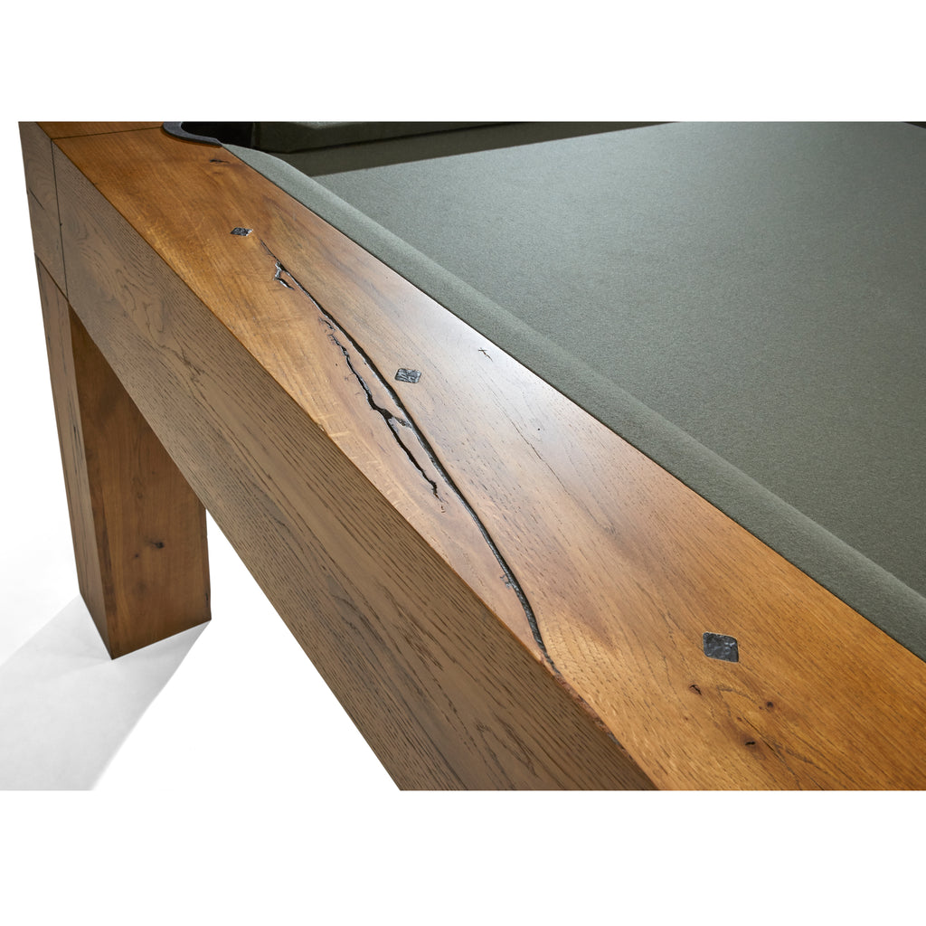 Parsons teak table closeup of rail with black sites and distress marks