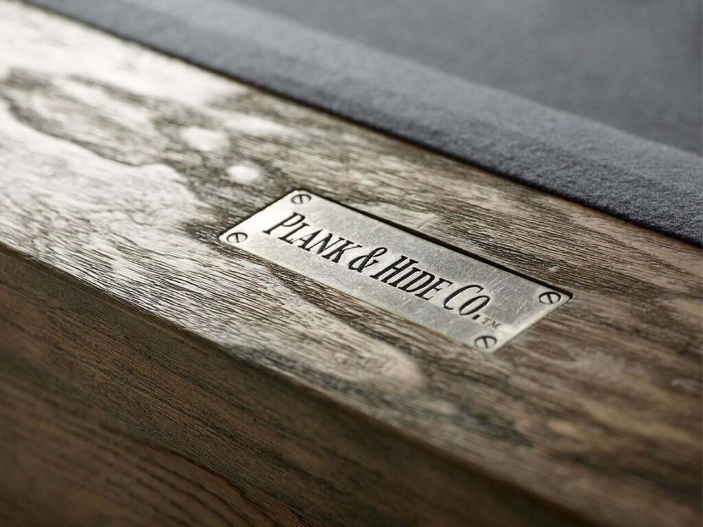 Plank and hyde logo on rail