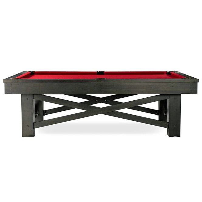 Overall side view of McCormick pool table shown with red felt