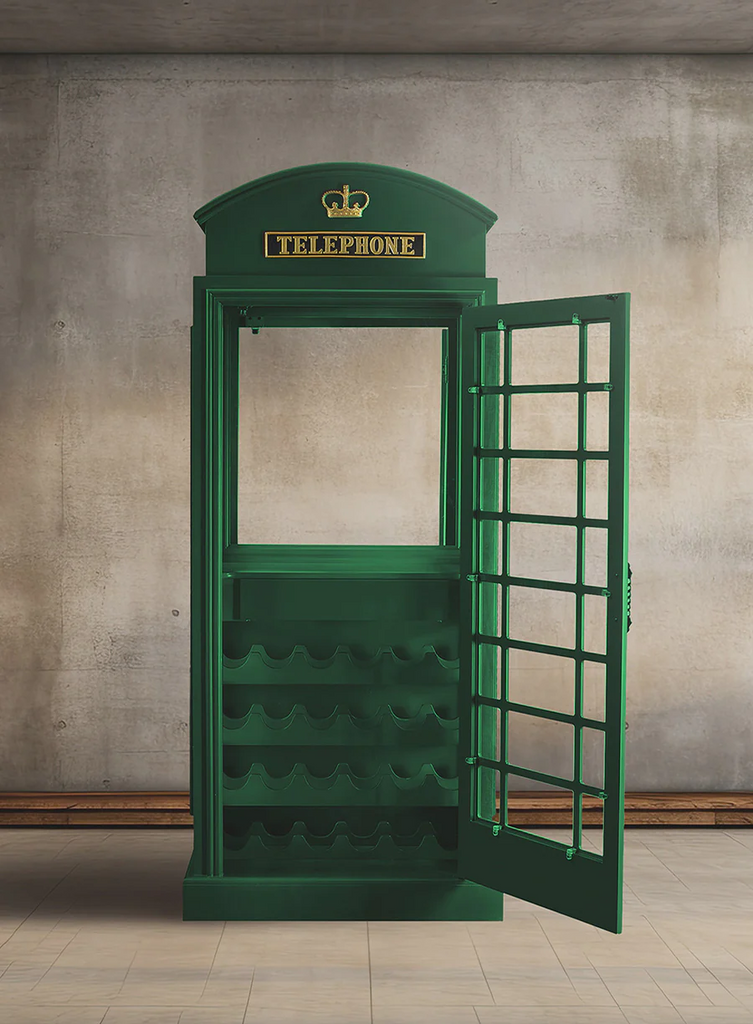 Green  phone booth with telephone on top and wine storage