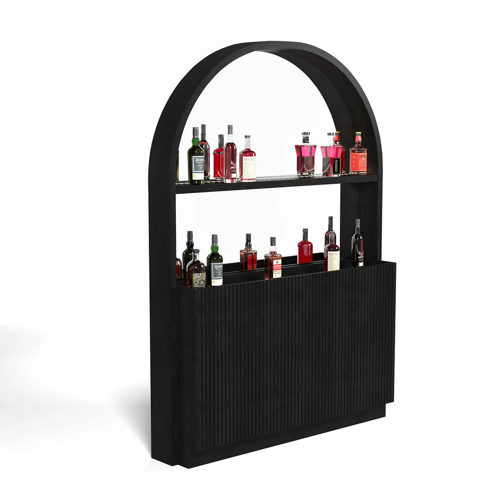 Black back bar with multiple bottles on shelves