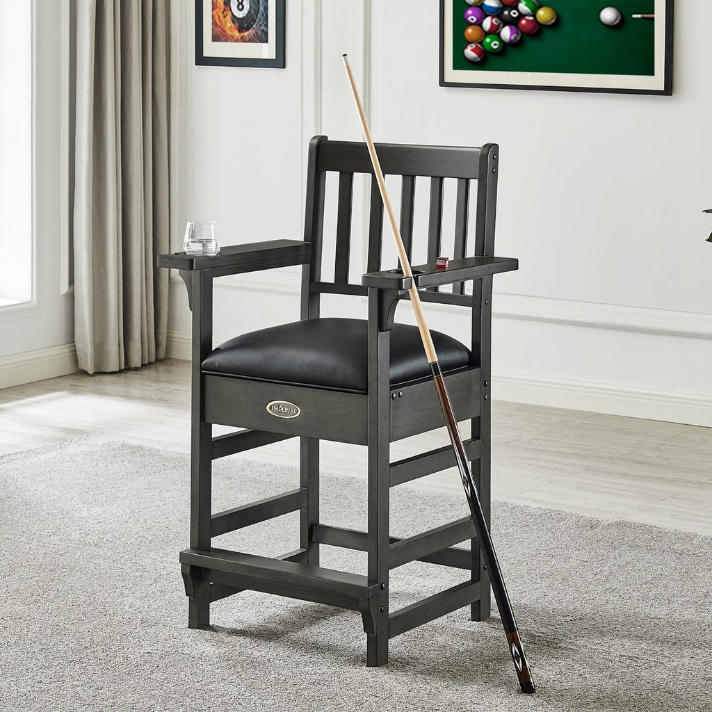 Grey Spectator Chair in Room with Cue leaning on rest