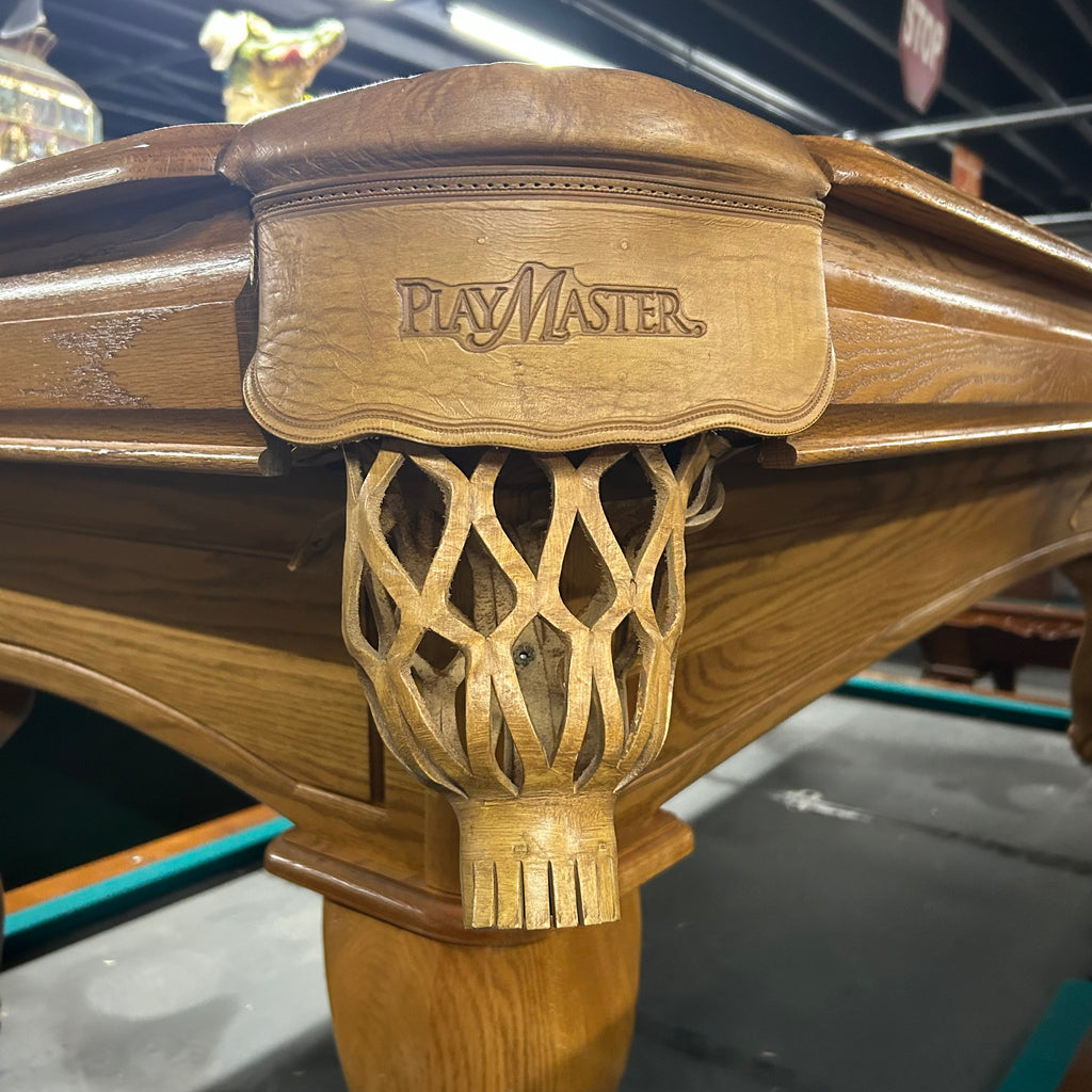 Pool table shield pocket in tan color with playmaster on the shield