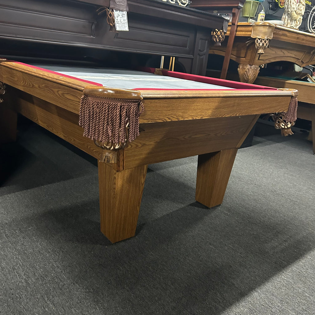 olhausen in medium oak finish with tan pockets fringe from left side