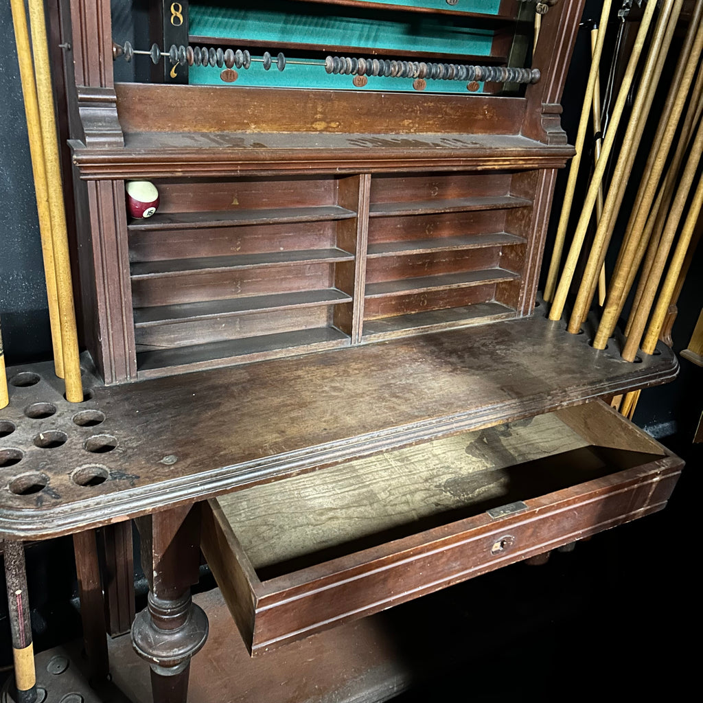 Closeup of open drawer with 4 rows of ball holders