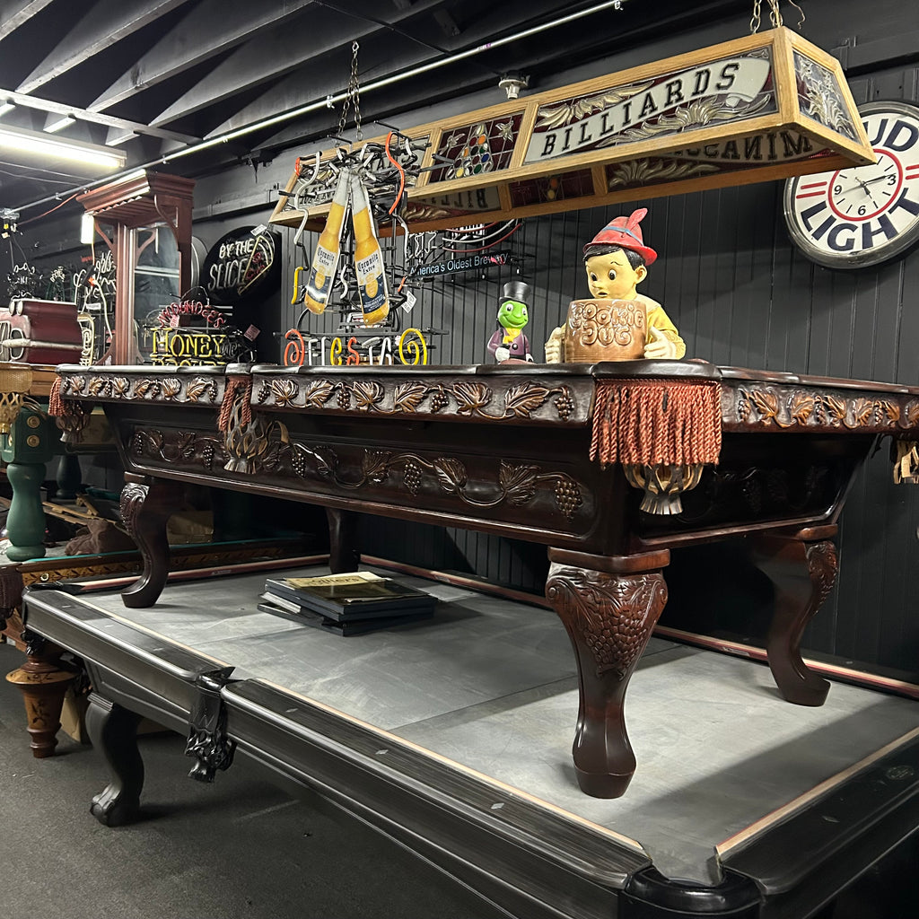 Overall view from right side of pool table with queen ann leg and carved details