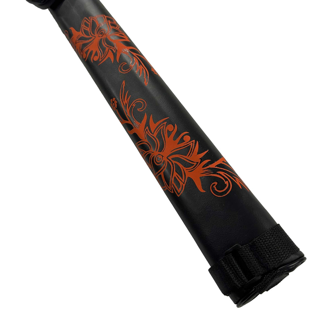 Close up of orange floral design on black cue case bottom