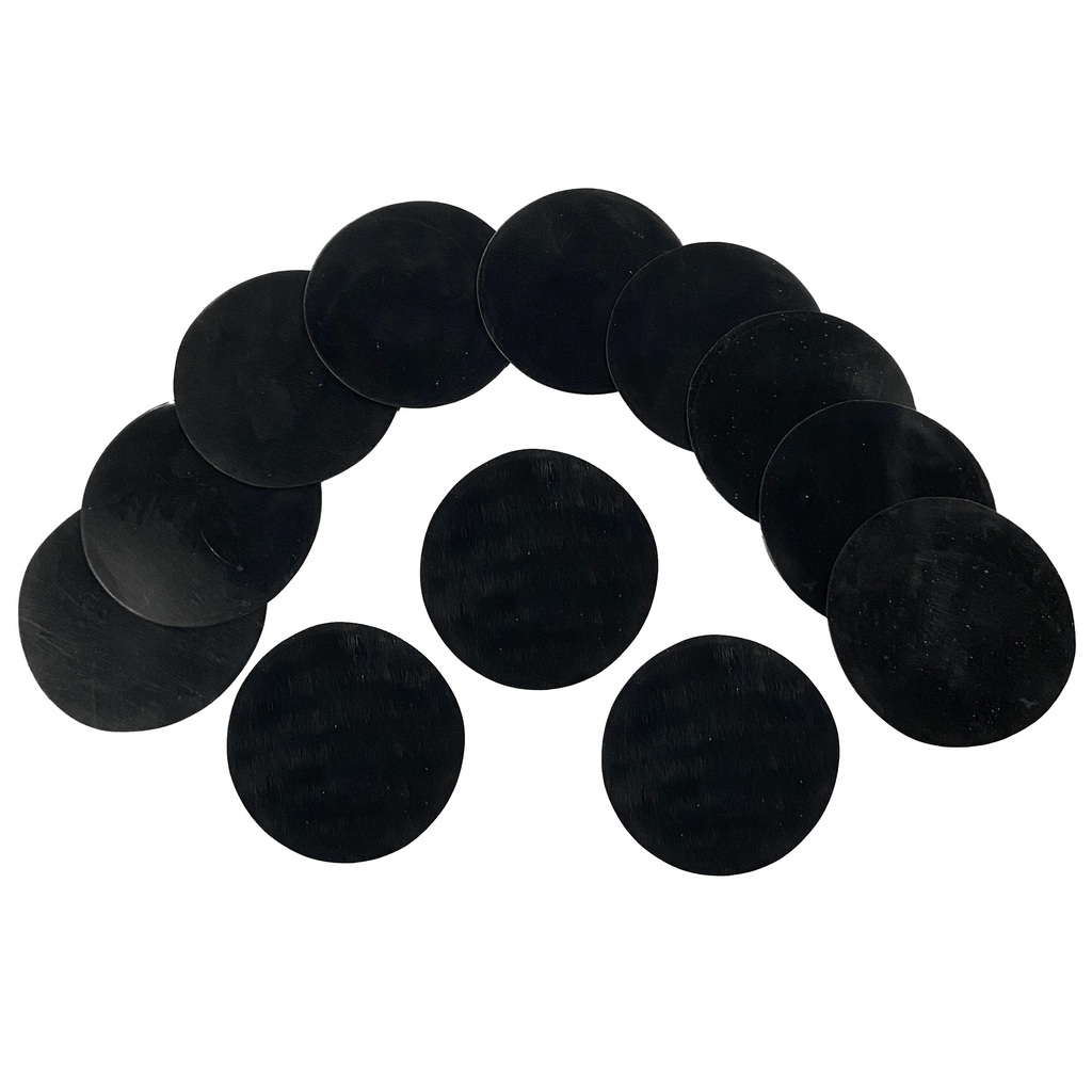 One thirty-second inch round rubber shim set 12 pieces 3 inches diameter