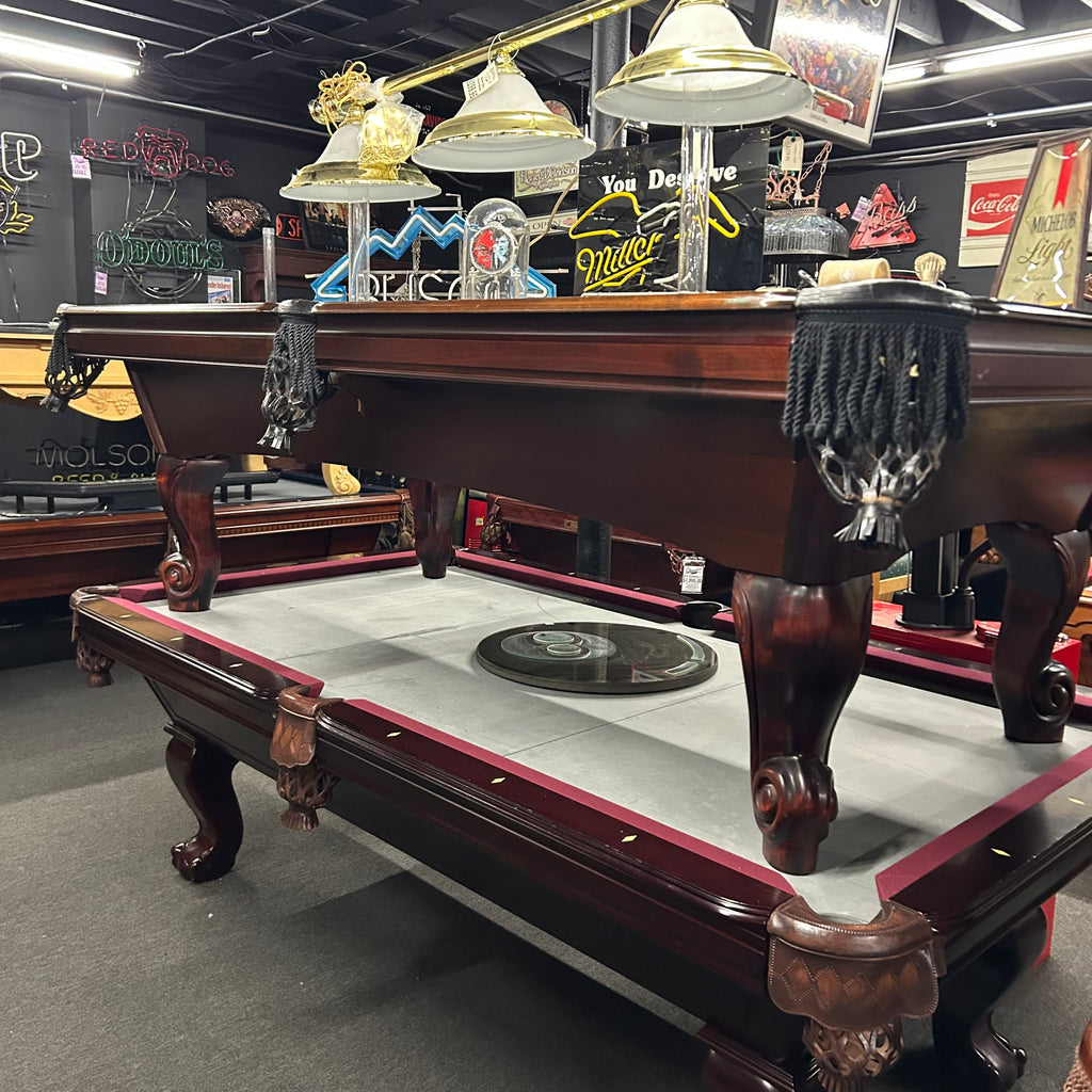 8ft AMF pool table with black fringe pockets and rams horn leg overall 