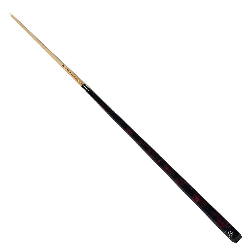 AA red and black swirl cue with engraved shaft on it