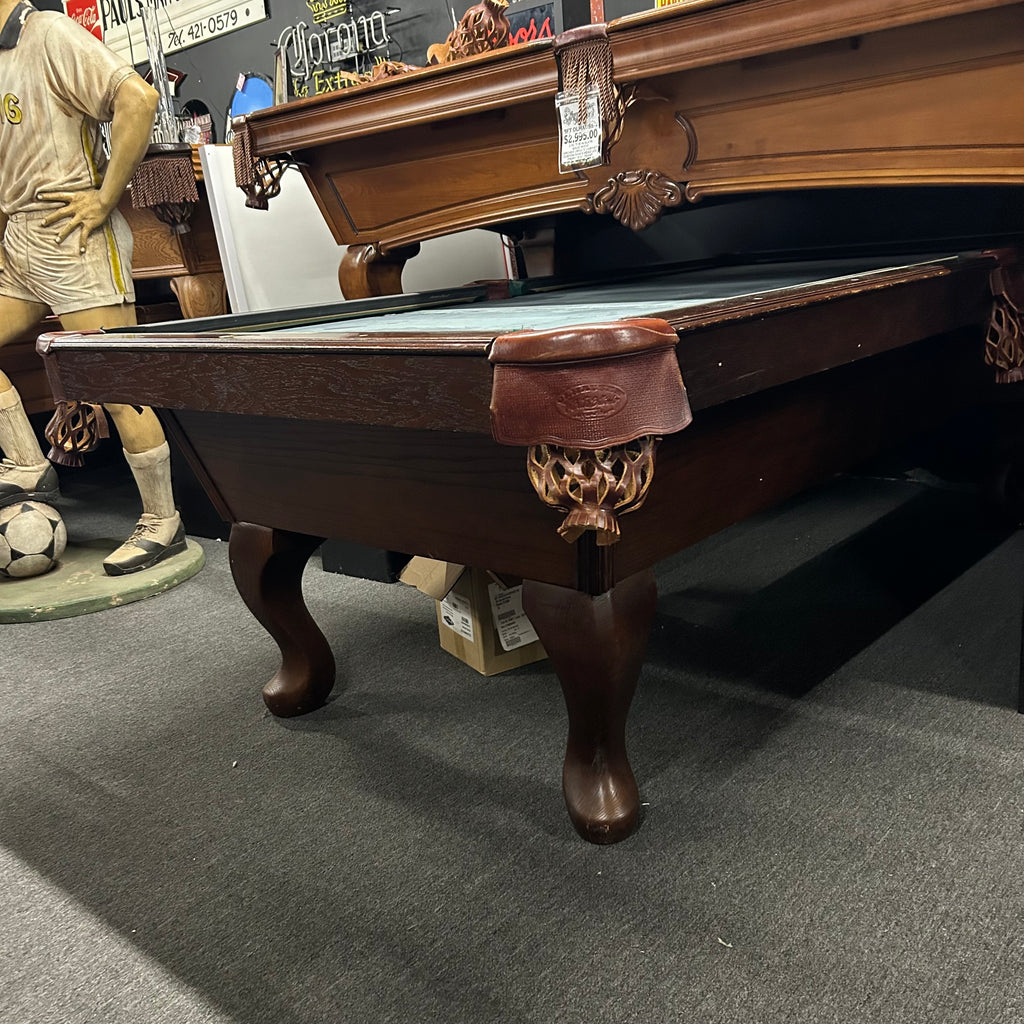 Full view of olhausen pool table with shield pocket and queen ann leg