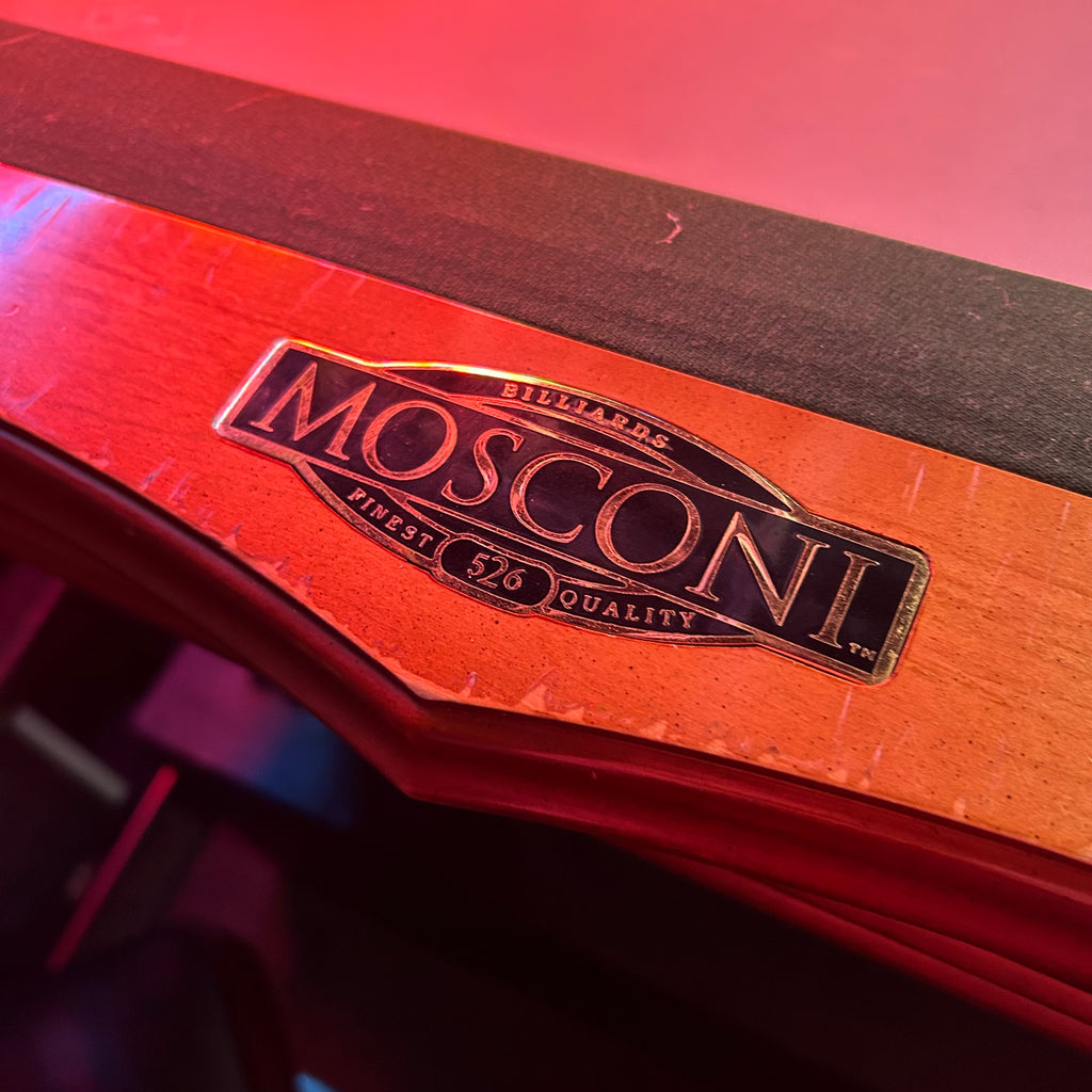 mosconi label in a red hazed view