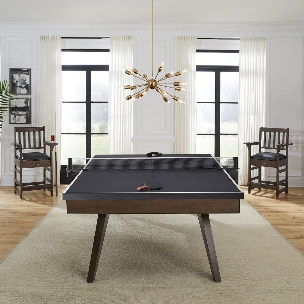 Thick black table tennis conversion top with net end view in room