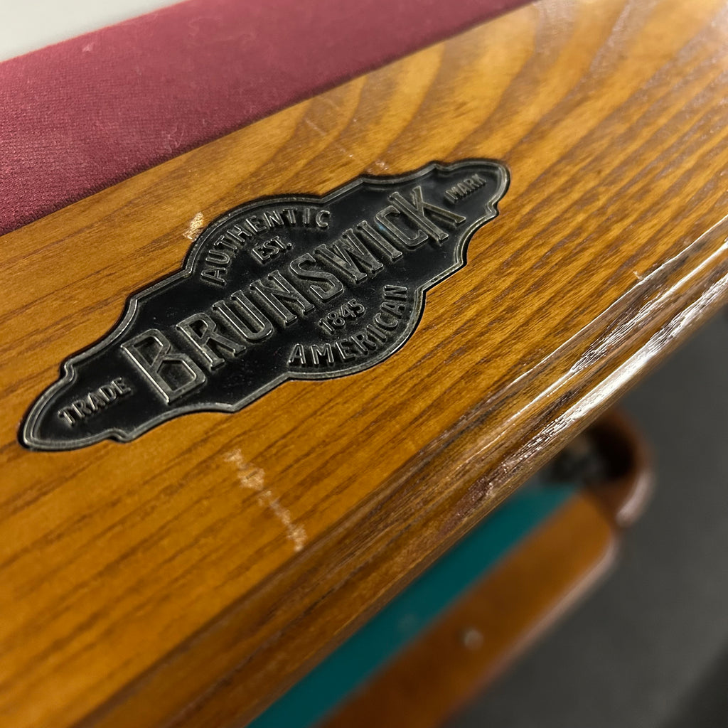 Brunswick logo on end rail with wine cloth