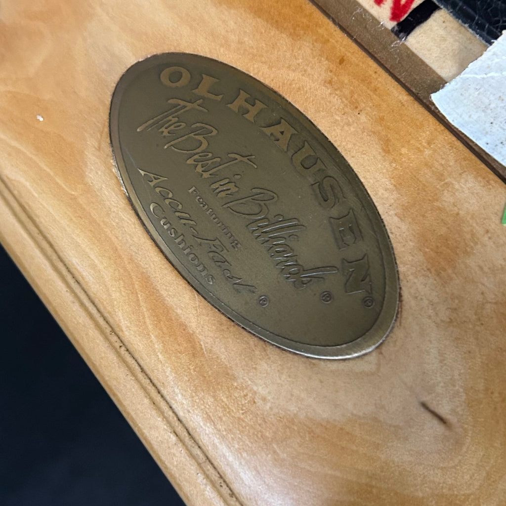 Olhausen logo on natural finish end rail