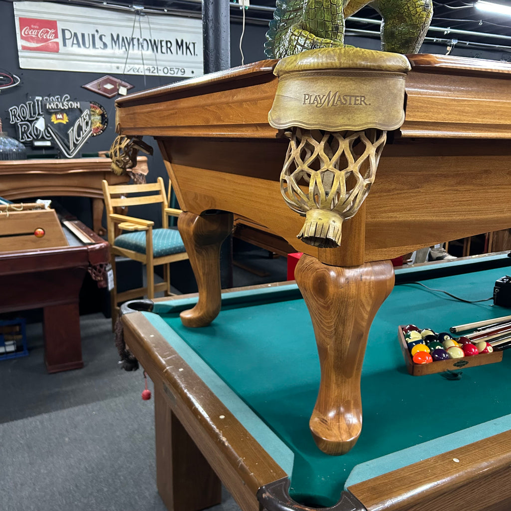 Corner view of pool table with shield pocket and queen ann leg