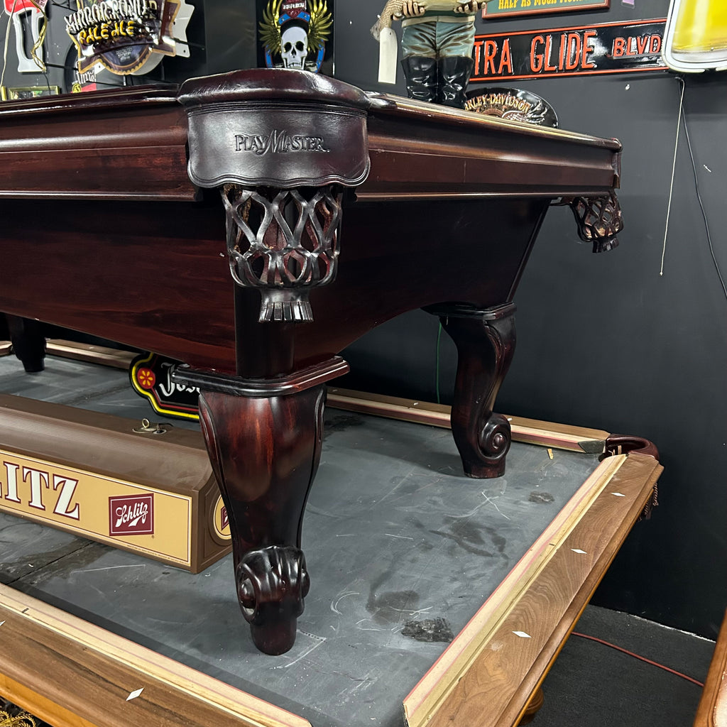 8ft mahogany finish amf pool table corner view with queen ann leg and leather shield pockets