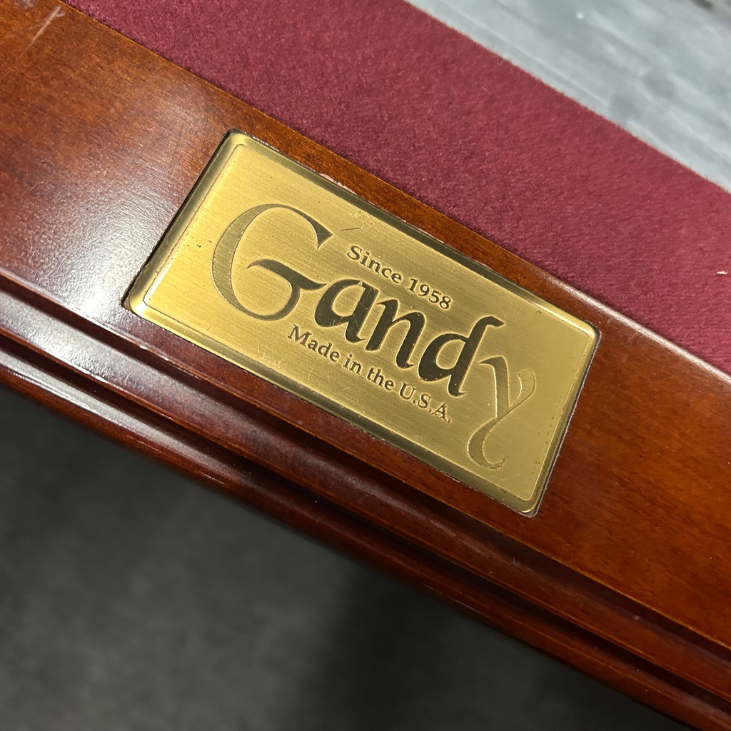 Gandy name plate on end rail in wine cloth with mahogany finish
