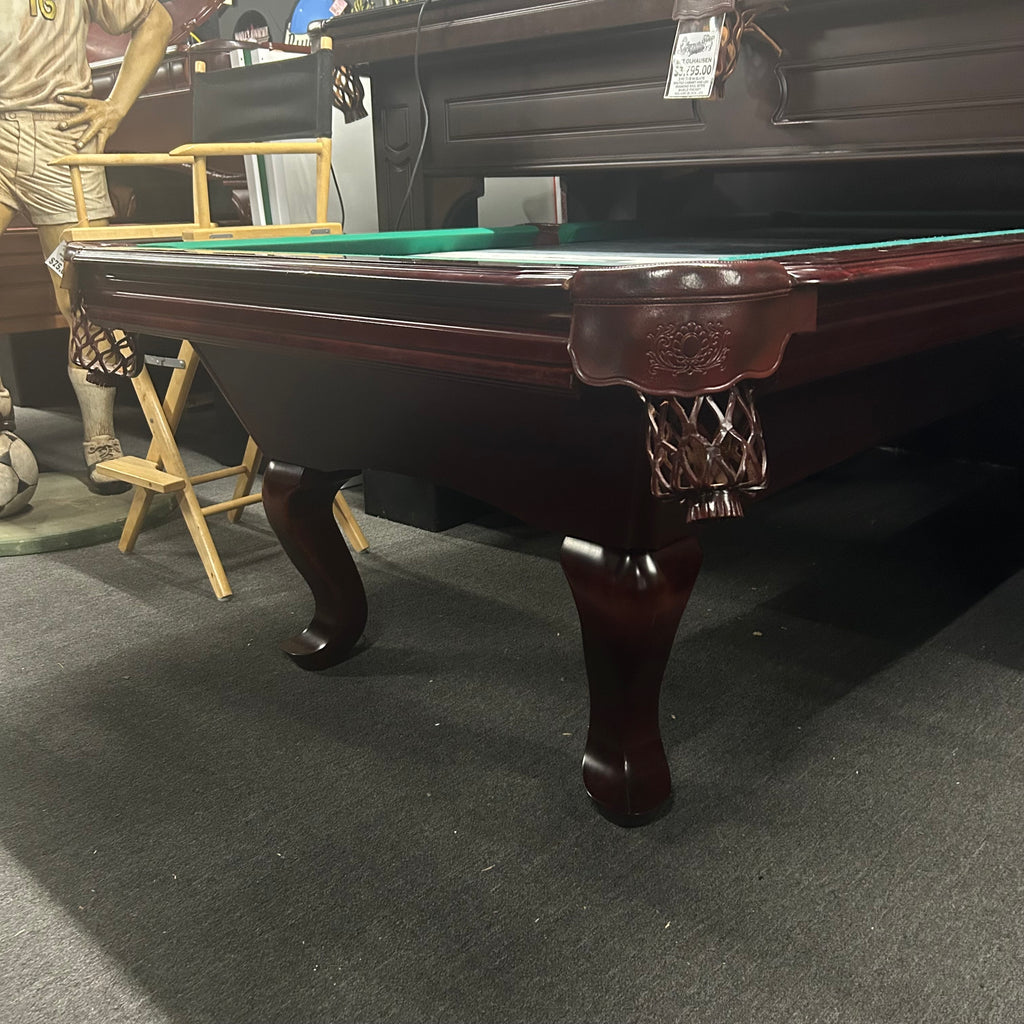 Full view pool table in mahogany with leather shield pocket and queen ann leg