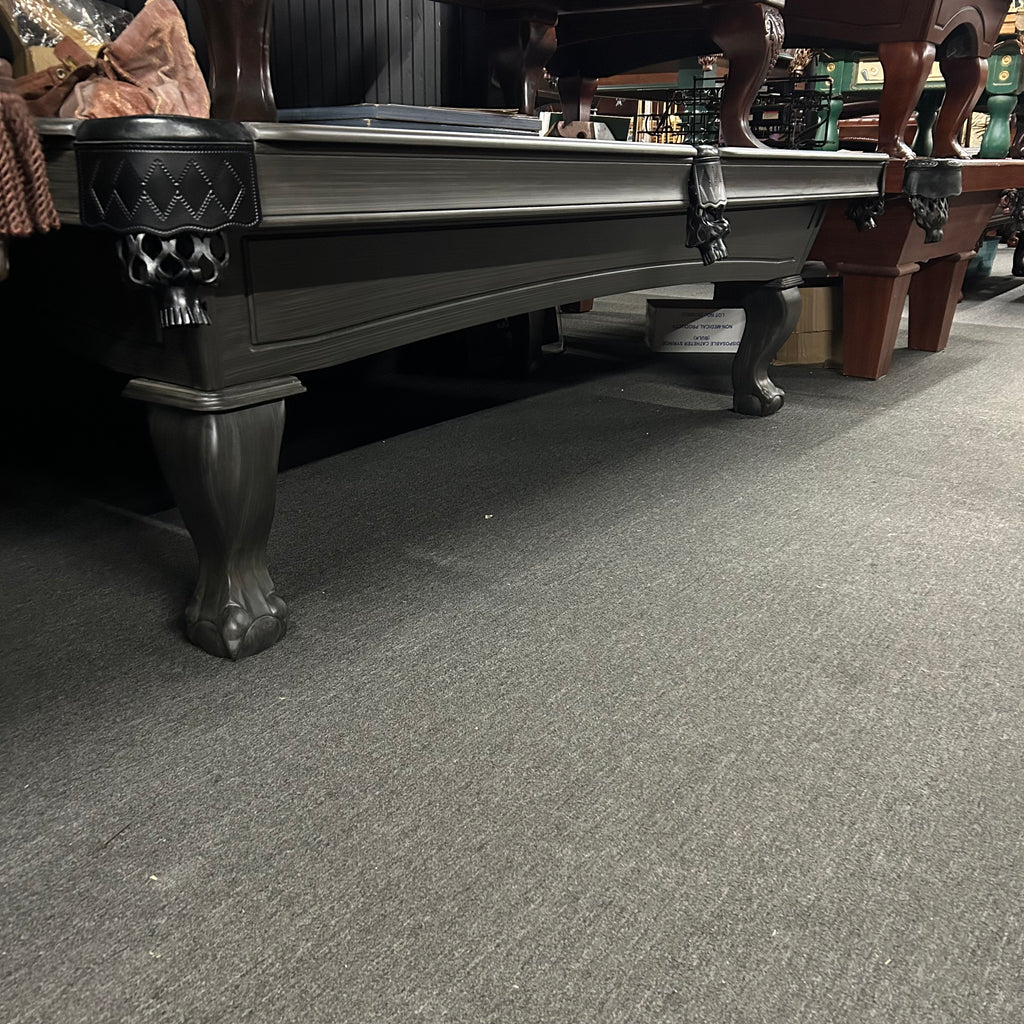 Overall view of kona finish pool table with black shield pocket and ball and claw leg