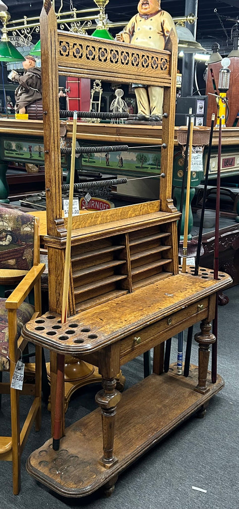 Late 1880s antique cue rack with scorers and drawers