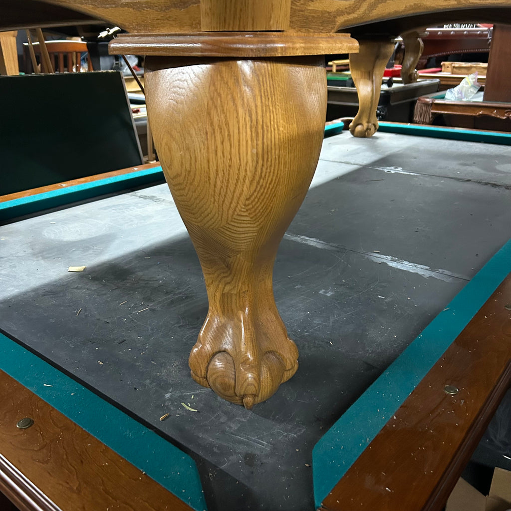 Pool table in oak finish ball and claw leg