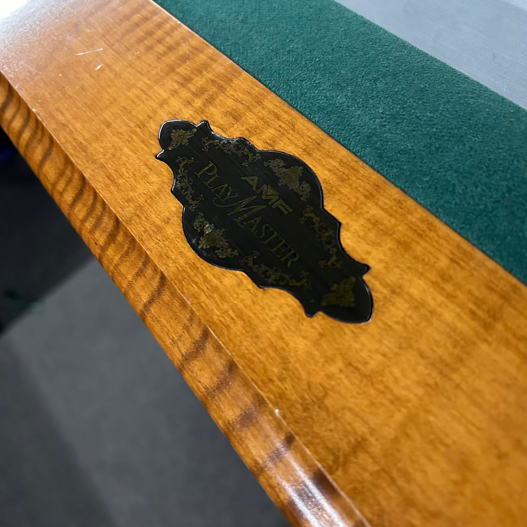 AMF Playmaster plaque on oak rail with dark green felt