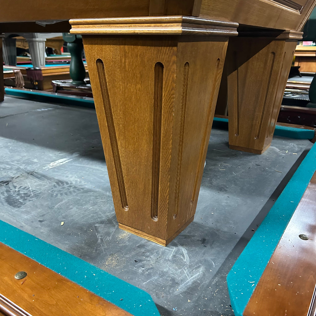 Tapered leg in medium oak finish 