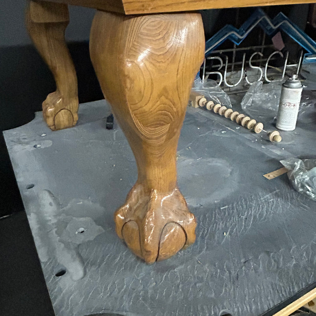 Ball and claw leg with oak finish