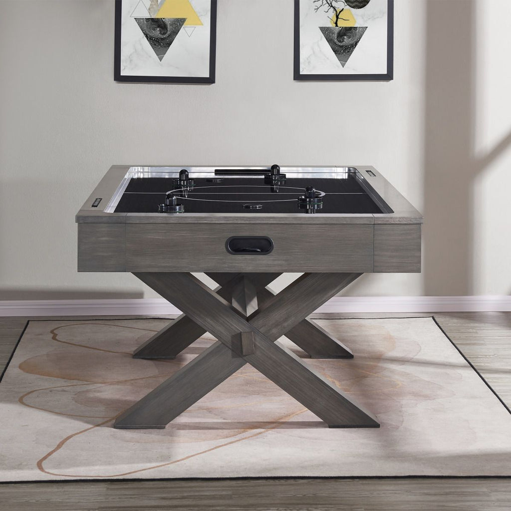 end view of air hockey table with pucks on it