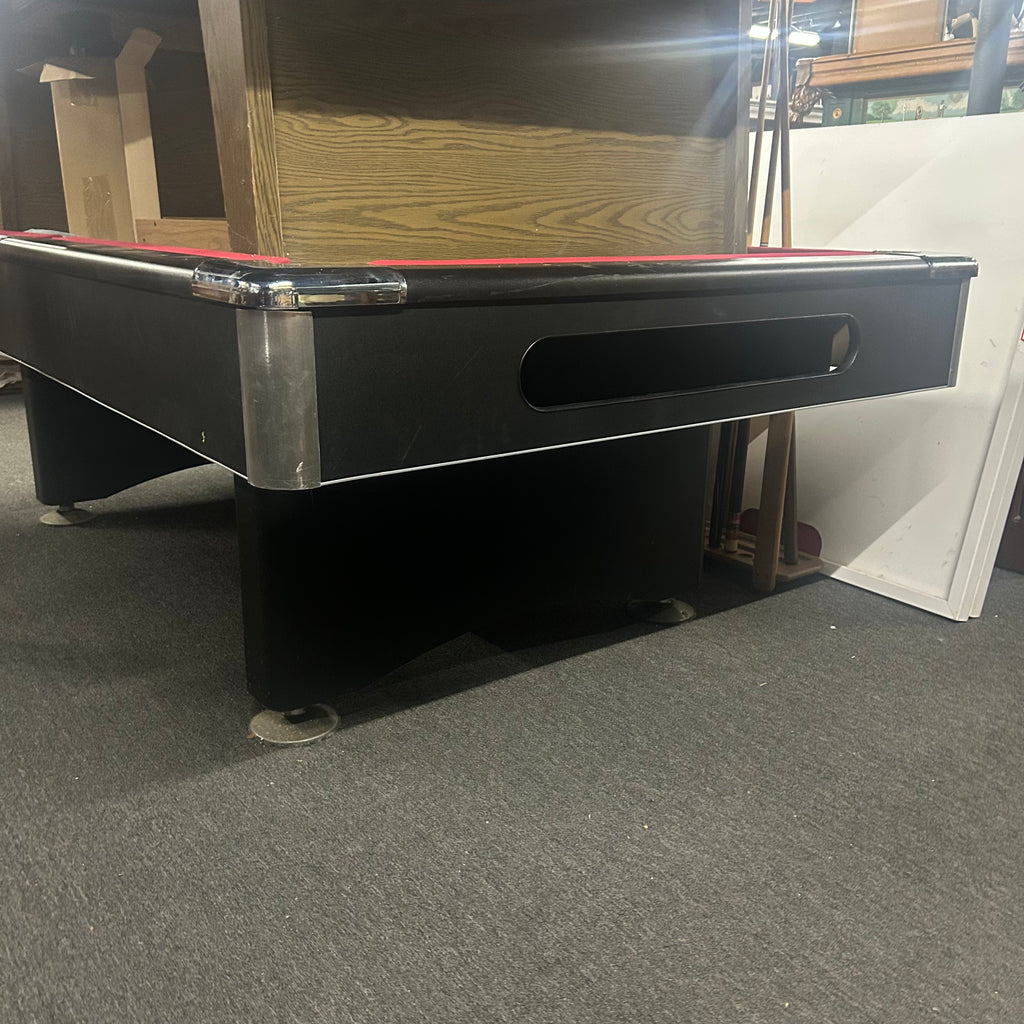 Black ball box with chrome trim on pool table