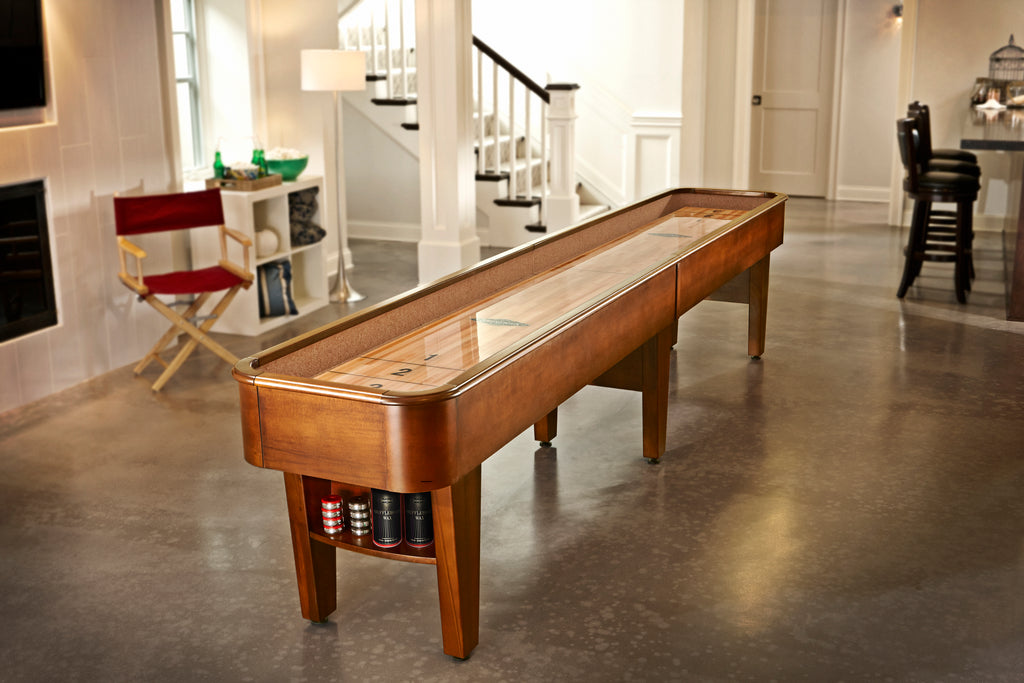 Concord shuffleboard in room on cement floor in chestnut finish