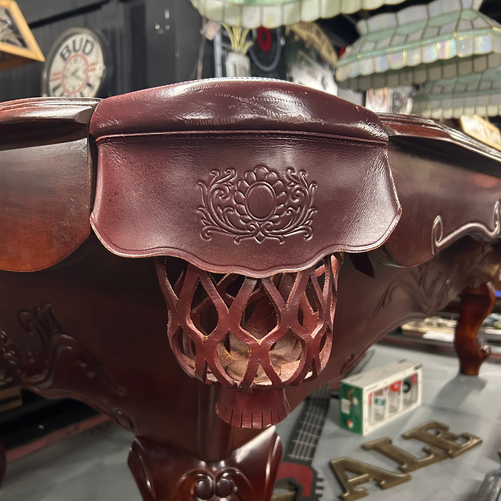 Leather shield burgandy colored pocket on pool table