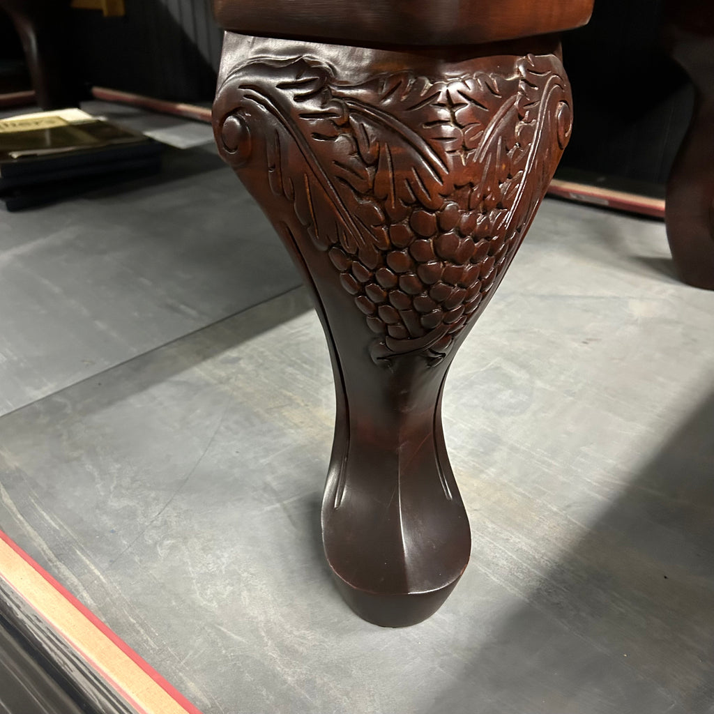 Queen ann leg with carved grape details