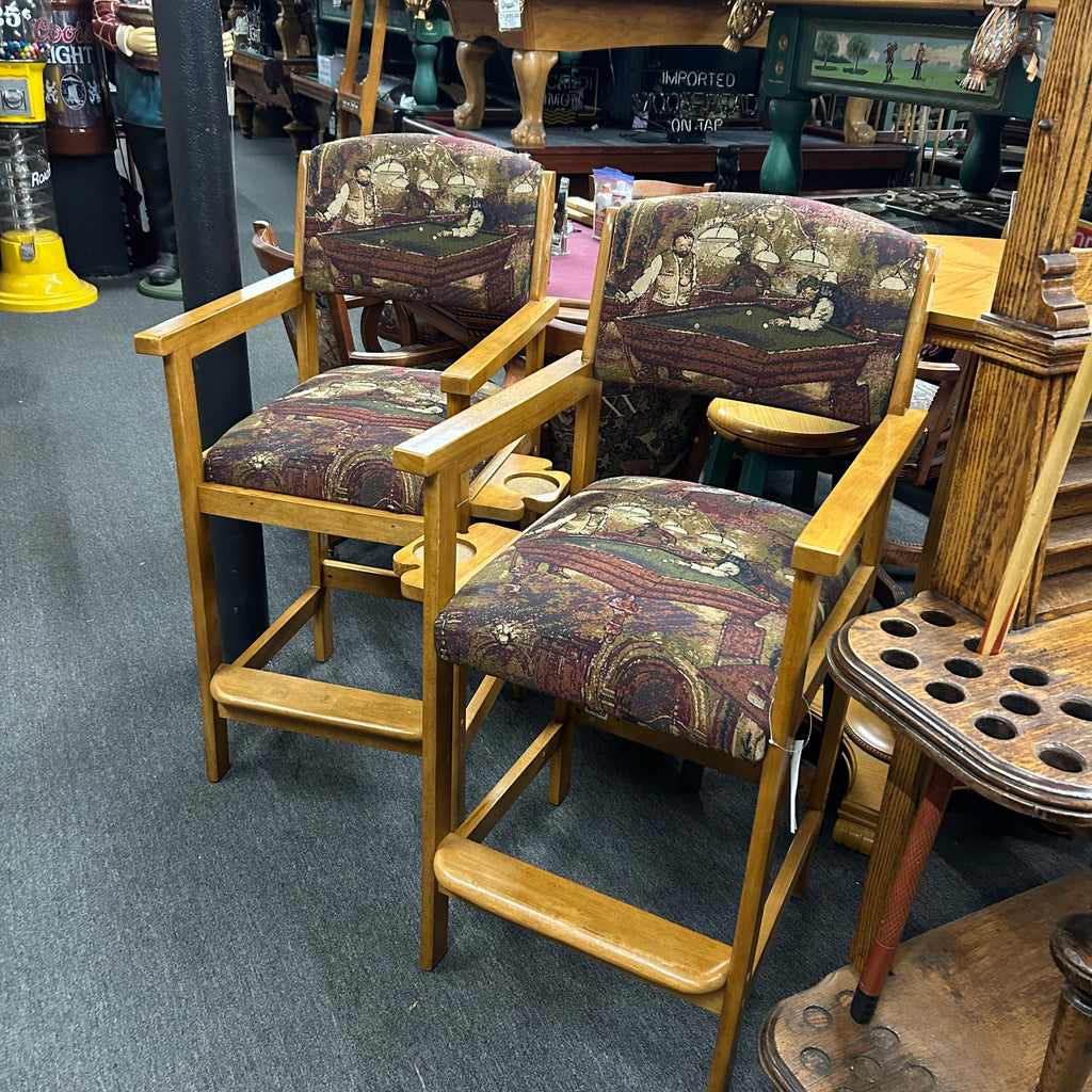 Two oak spectator chairs with pool scene on cushions