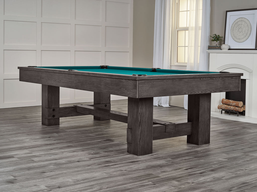 Montana pool table in charcoal finish with green cloth  in room at an angle