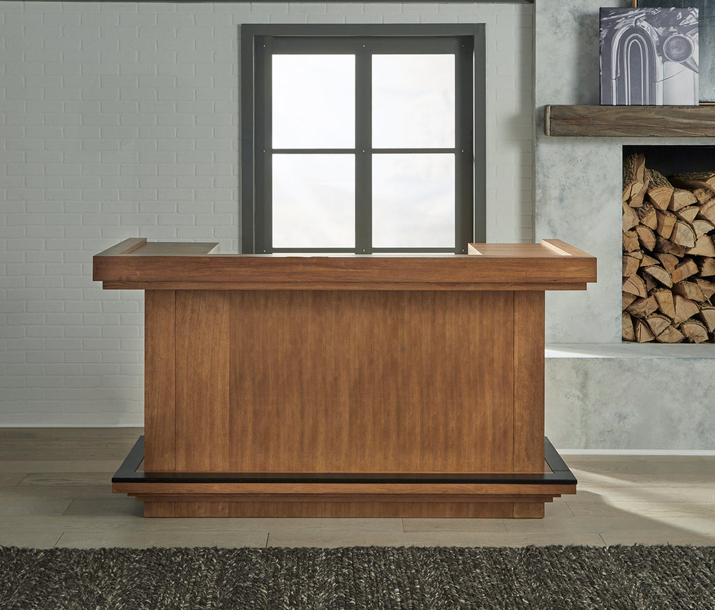 Alta home bar in room in walnut finish with black footrail