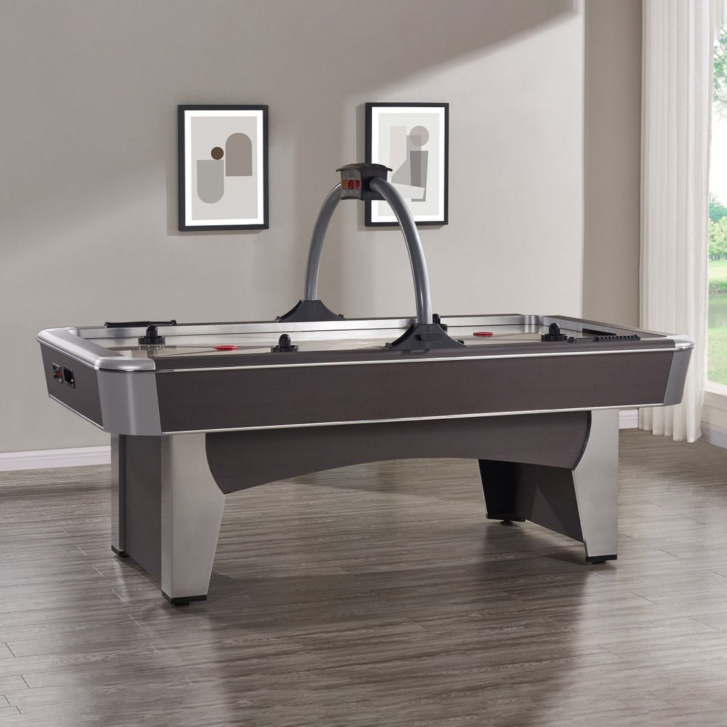 Side view of air hockey table with silver and brown accents