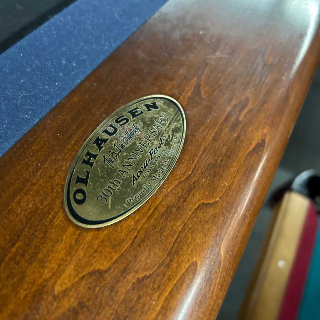 Closeup of olhausen nameplate with blue cloth