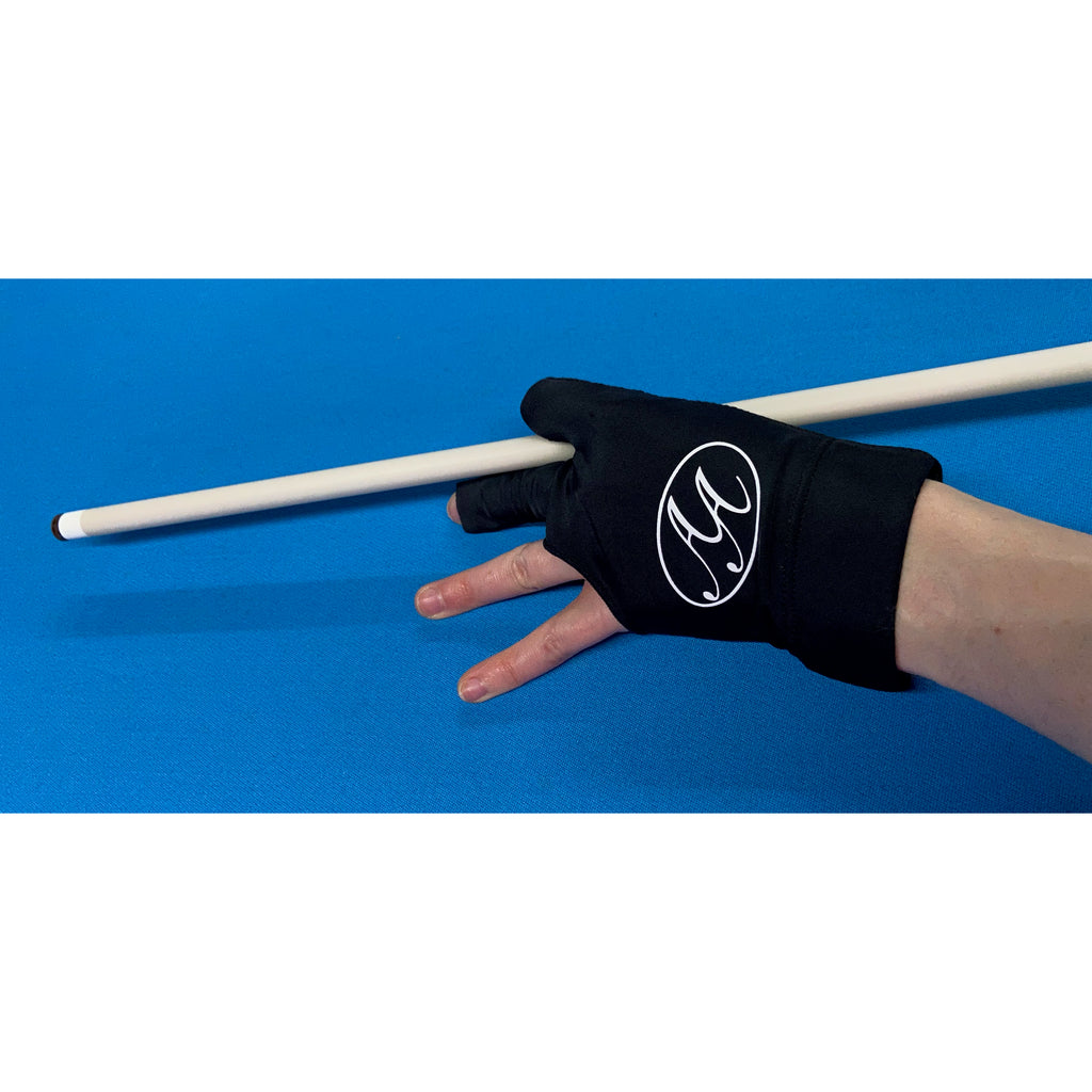 Left handed black pool glove with person holding cue]