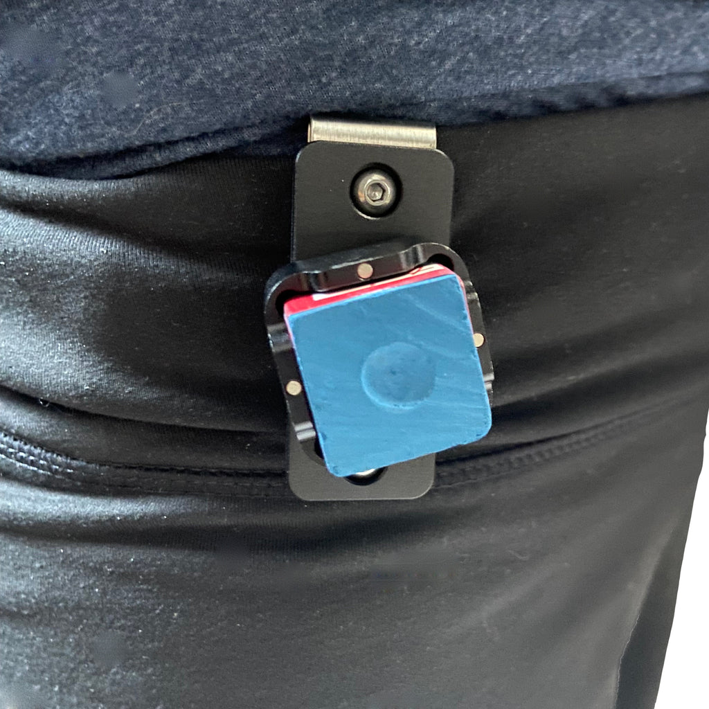 Open pocket chalker on belt with piece of blue chalk