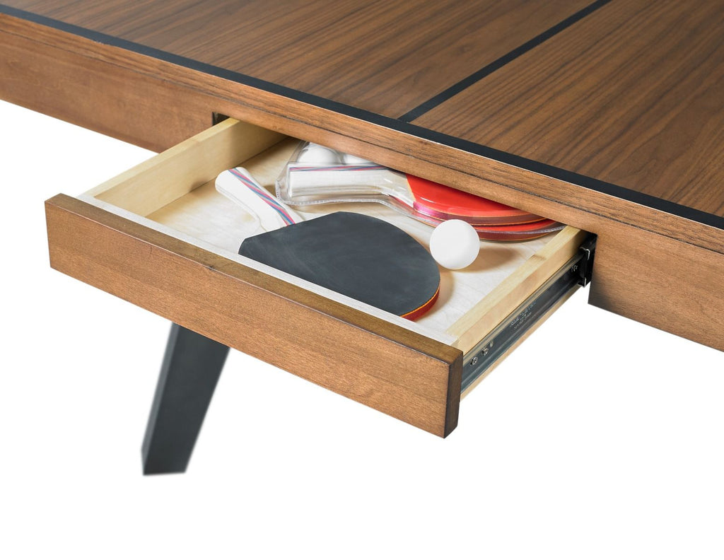 Drawer of ping pong table with paddles inside 