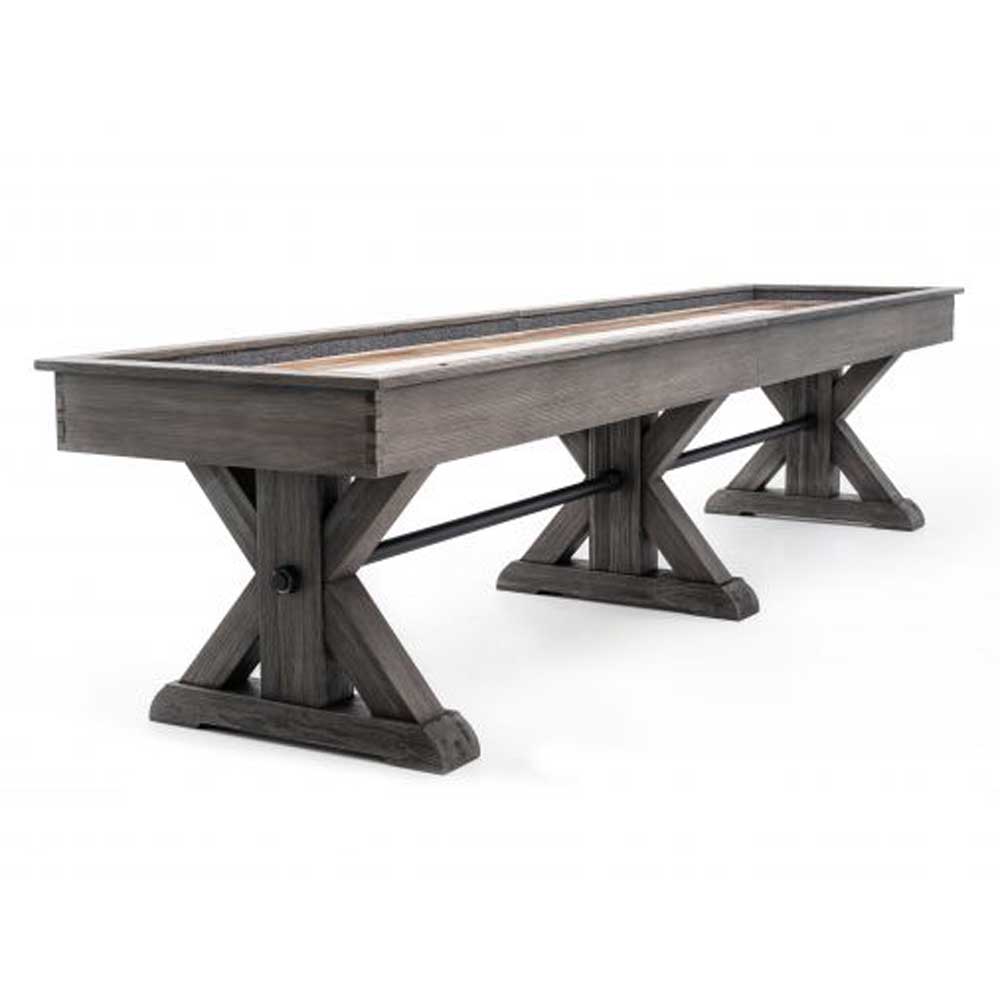 Otis shuffleboard table in weathered grey finish with metal stretchers and three criss cross pedestal base legs