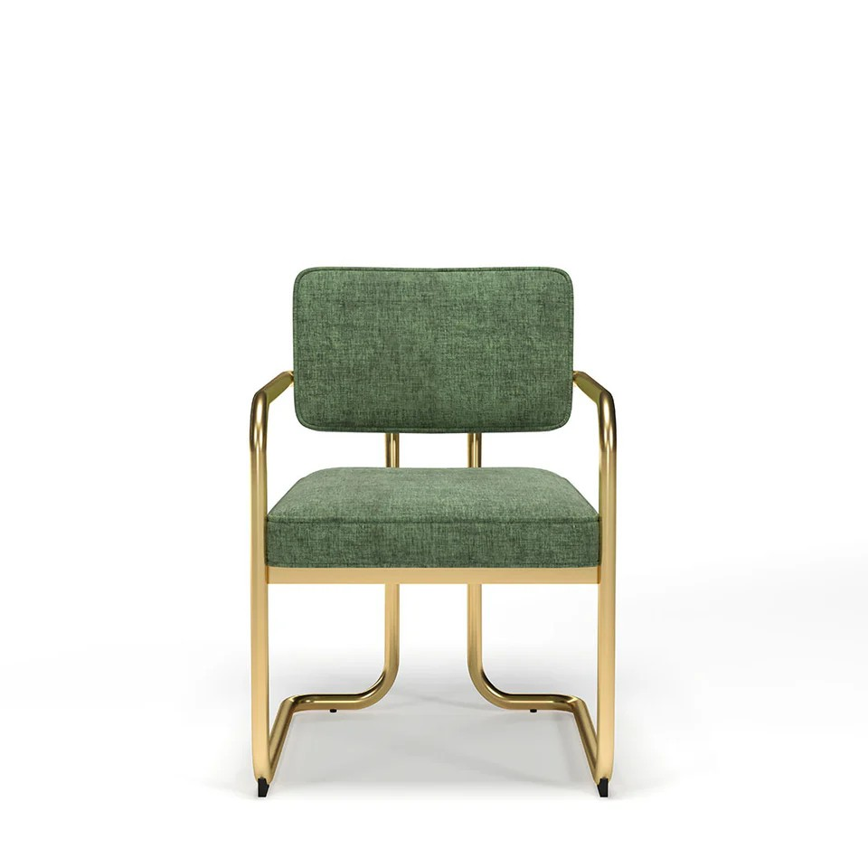 brass chair with green cushion