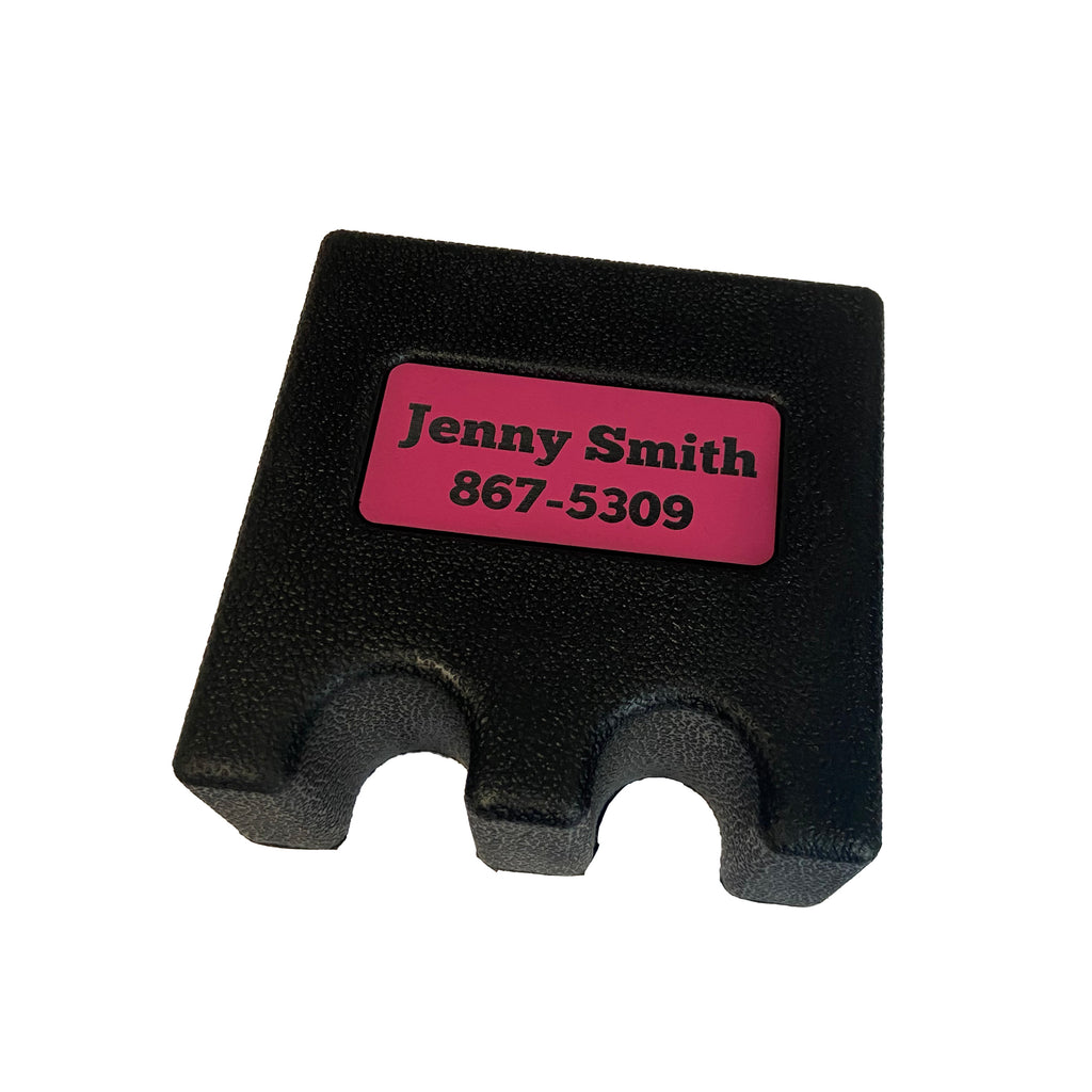 Q claw that holds 2 cues with pink plate in a block font reading Jenny Smith top line and 867-5309 bottom line