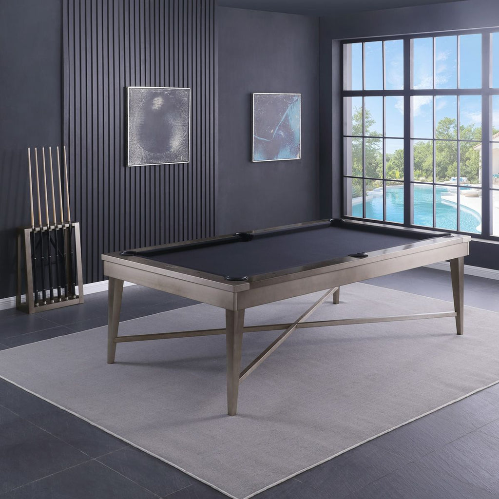 Saxon pool table in room with dark blue felt and blue walls behind it